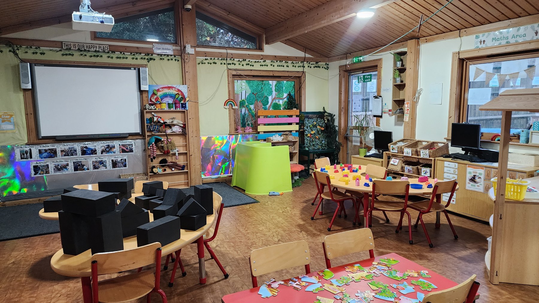 Dickory Docks classroom set up with activity tables and resources